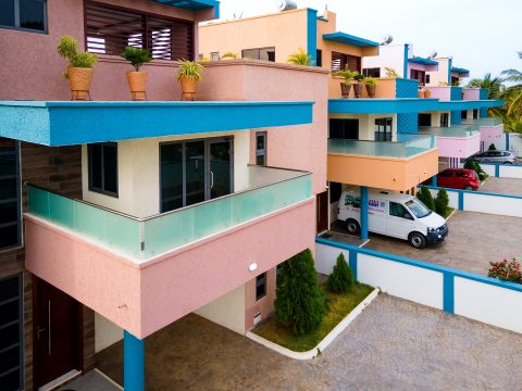 Apartment balconies and the gated parking courtyard