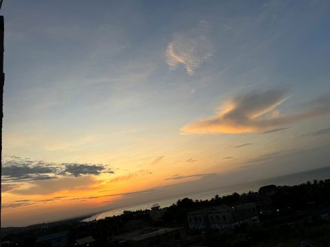 Sunset clouds over the coast near the residence